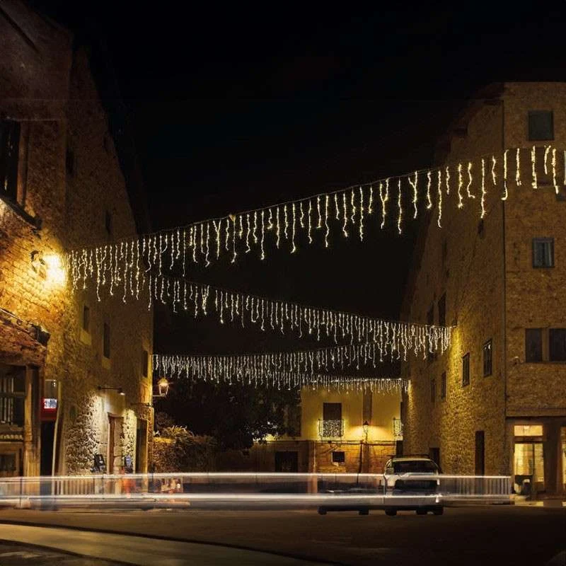 Cortina de 576 LEDs luz fría exterior y efecto lluvia 400 x 70