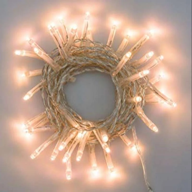 Tira 100 LED cálida enlazable 6,5 mts luz fija cable transparente