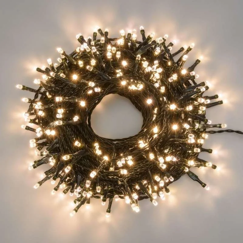 Tira 100 LED cálida enlazable 6,5 mts luz fija cable verde